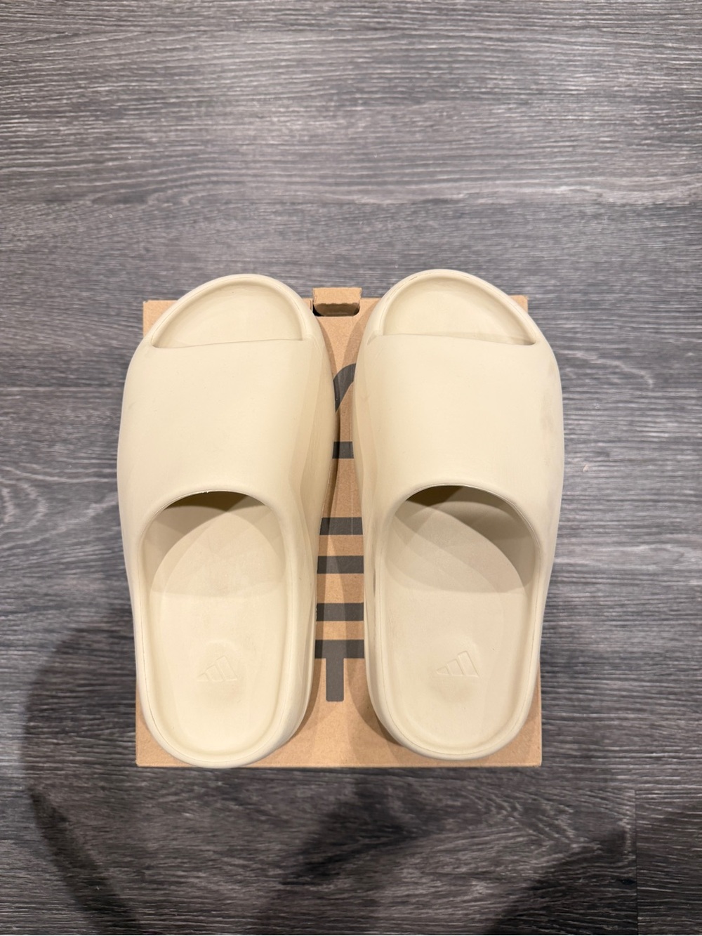 Adidas Yeezy Slides in Color Bone